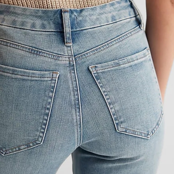 Express Mid Rise Light Wash Raw Hem FlexX '70s Flare Jeans - Picture 5 of 5